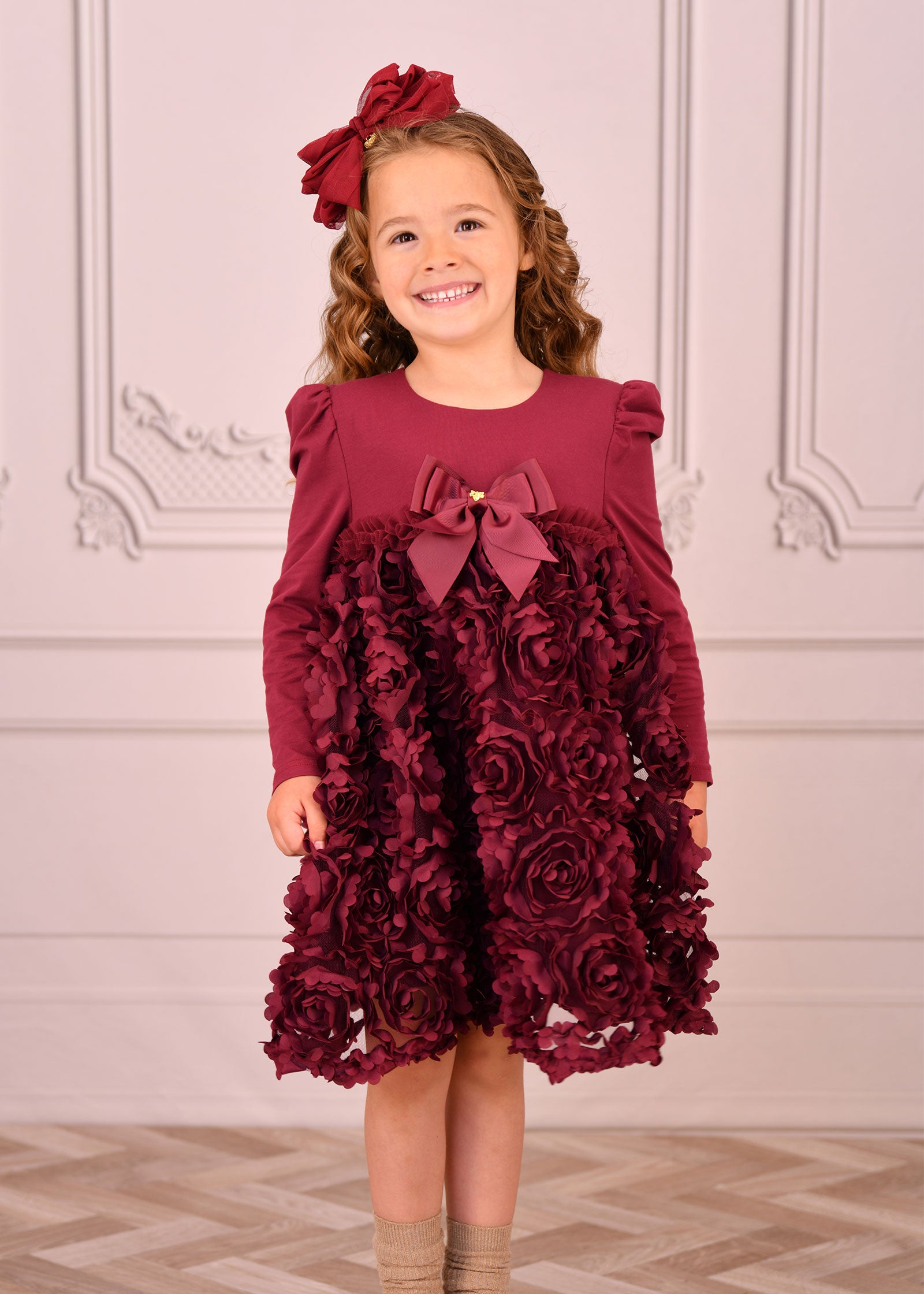 burgundy dress with roses Elegant burgundy dress adorned with roses on the shoulder